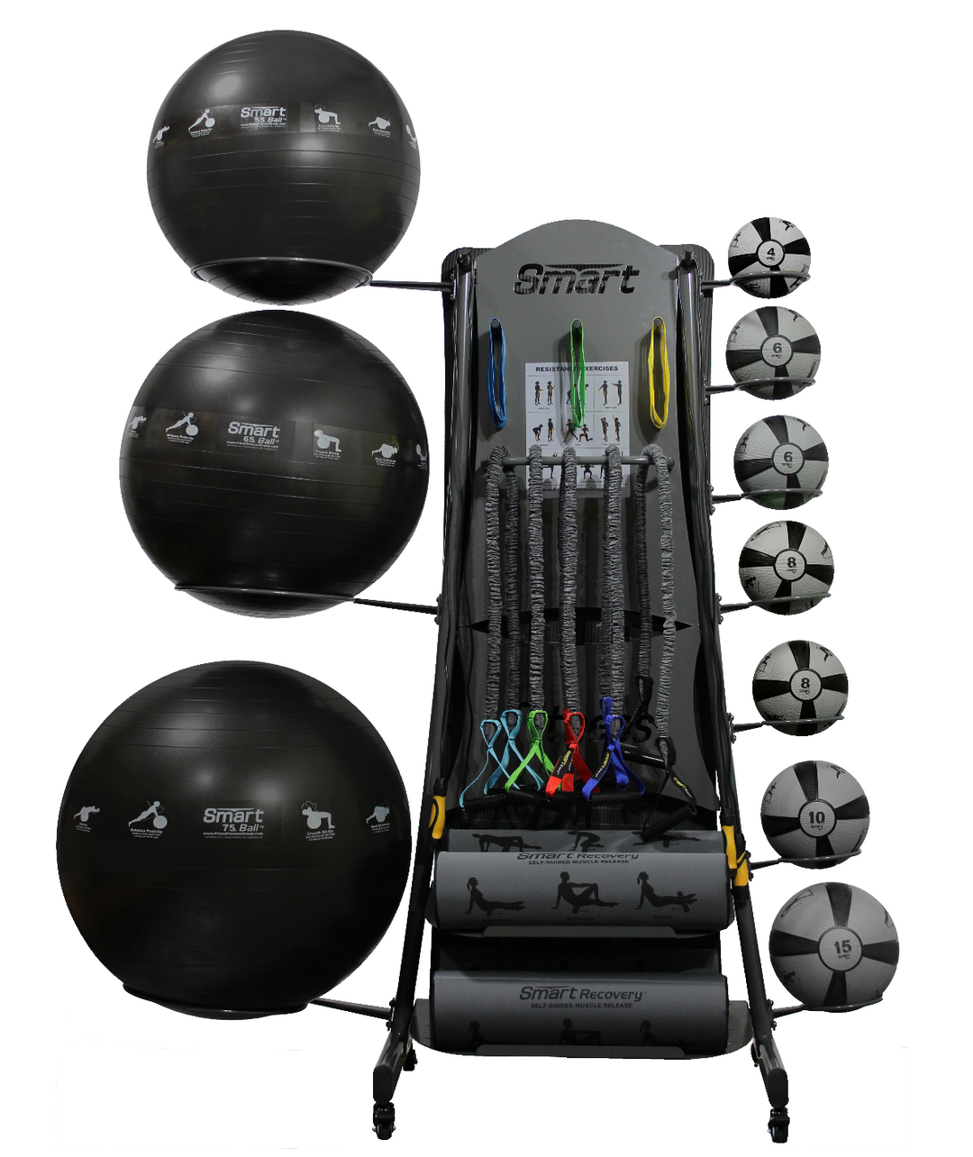 Gym equipment set including exercise balls and weight plates on a white background
