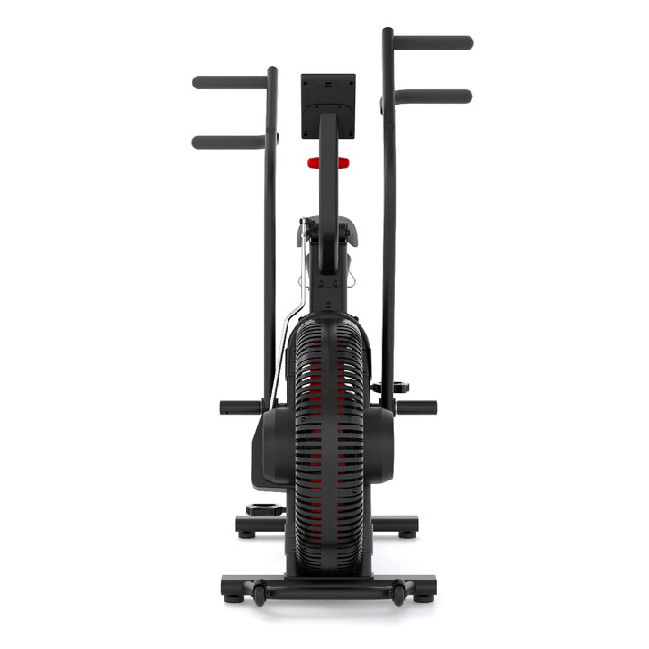 Black exercise bike with handlebars on a white background